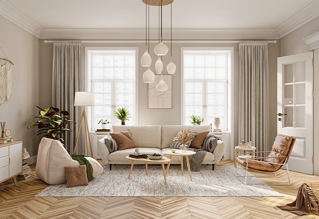 Salon z białą sofą i jasnymi meblami