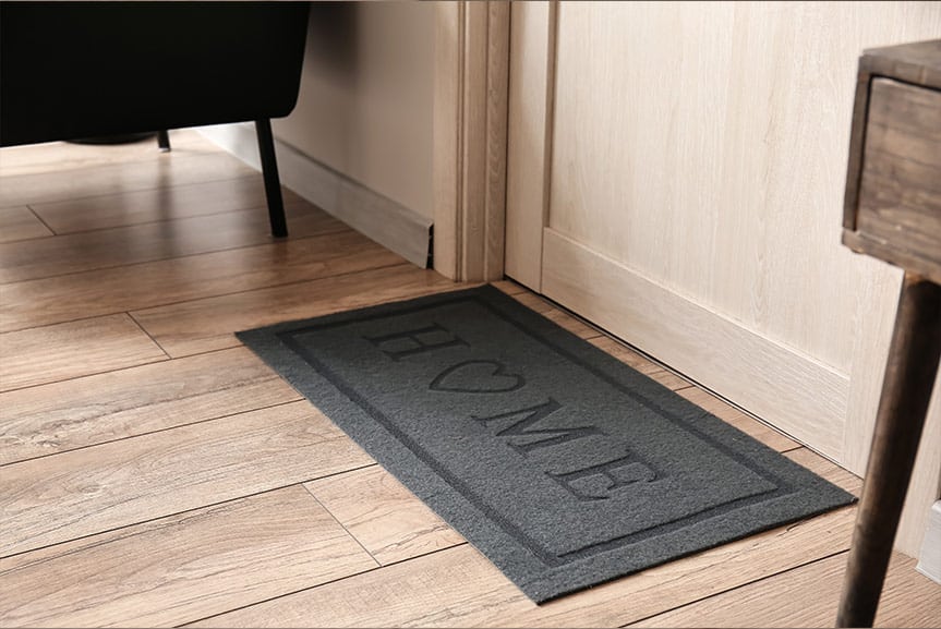 Wycieraczka z napisem - obszar wejścia